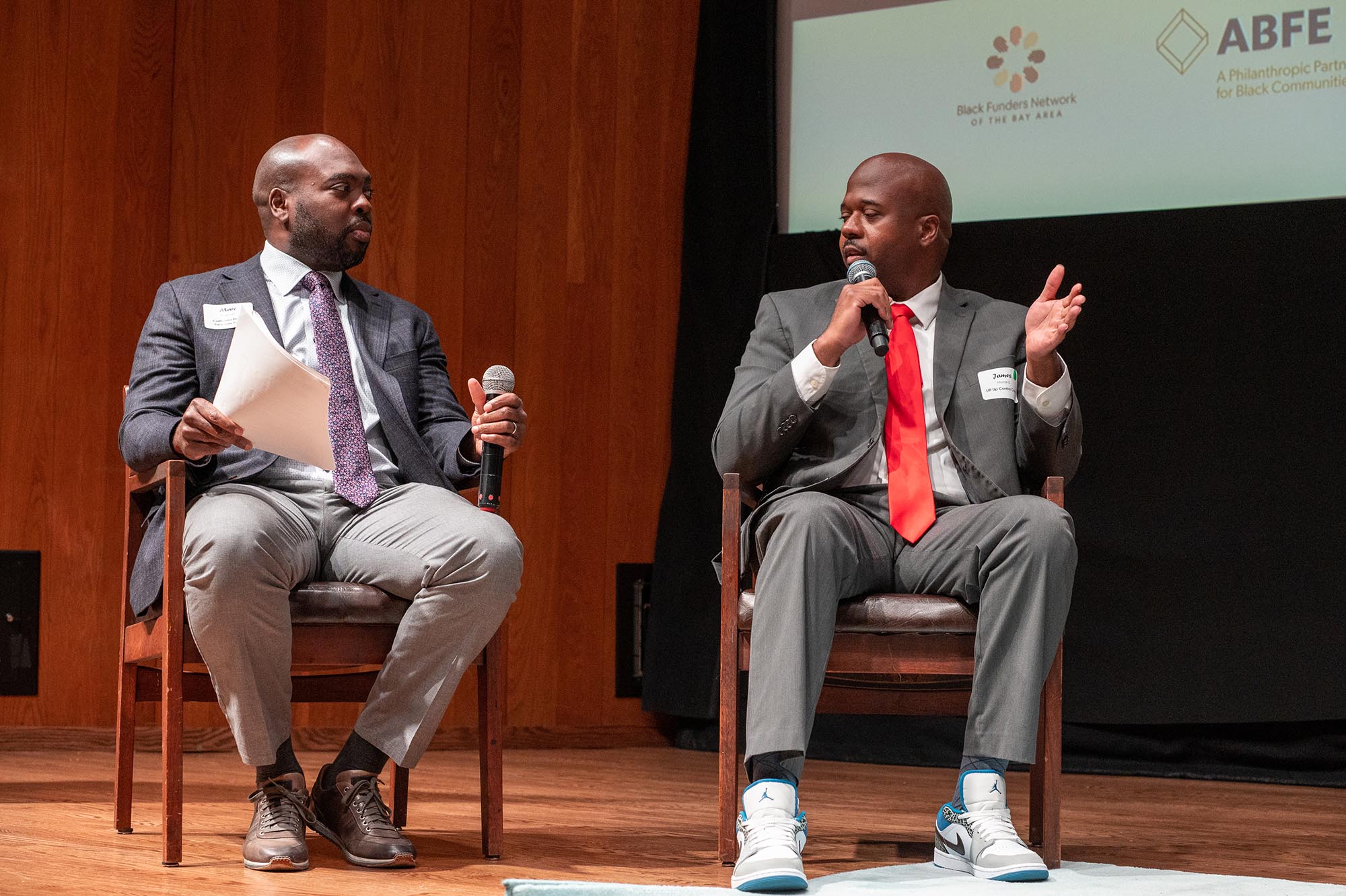 Two black men speaking at 2023 Black History Month Funder Reception