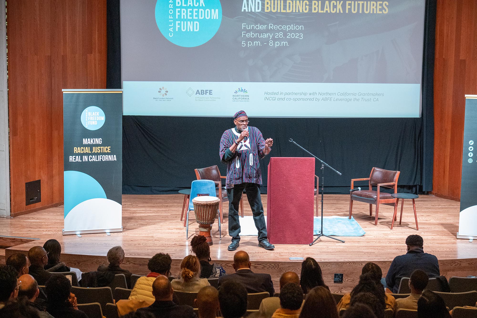 Man speaking from stage