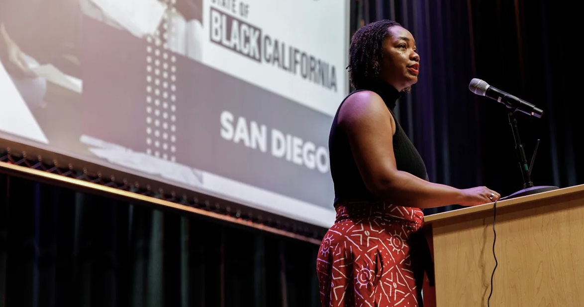Assemblymember Akilah Weber speaks during the State of Black California Tour at Crawford High School in San Diego on June 15, 2024. Photo by Kristian Carreon for CalMatters