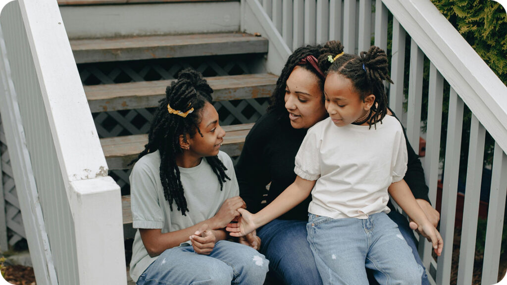 black mother with two small children