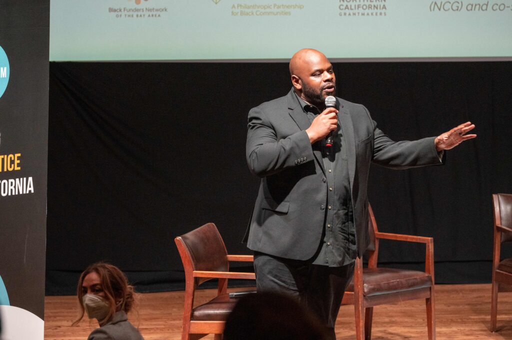 black man with a microphone