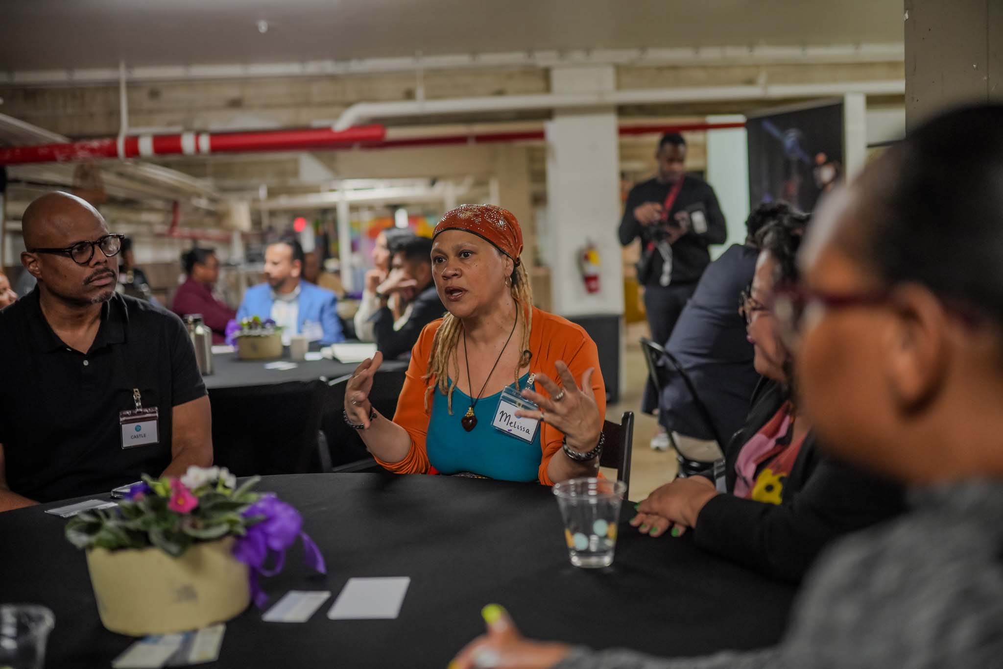 Woman speaking at Fresno Black Pow(Her) Building Event