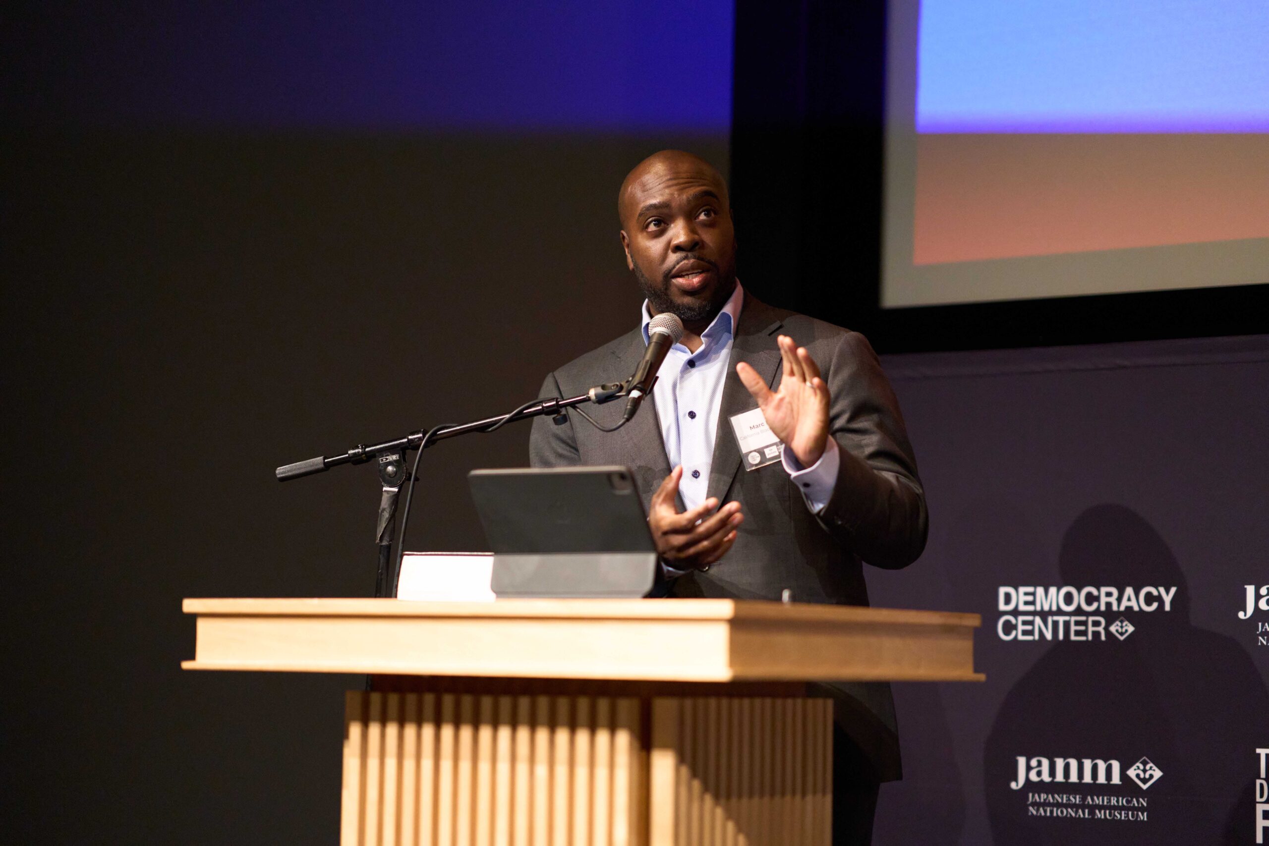 Man speaking at podium