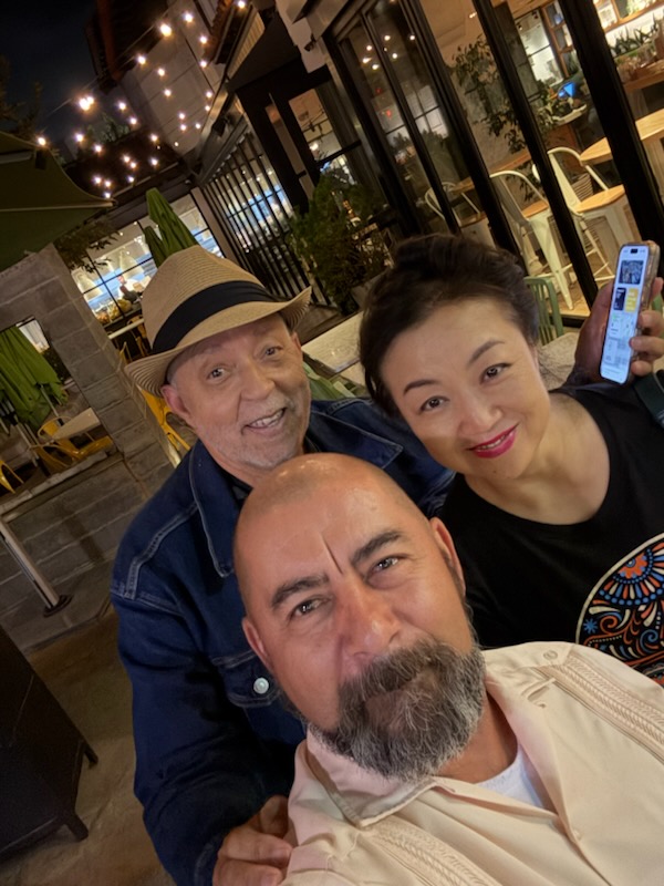 2025 Okobi Sabbatical participant, Martin Gordon, with two friends